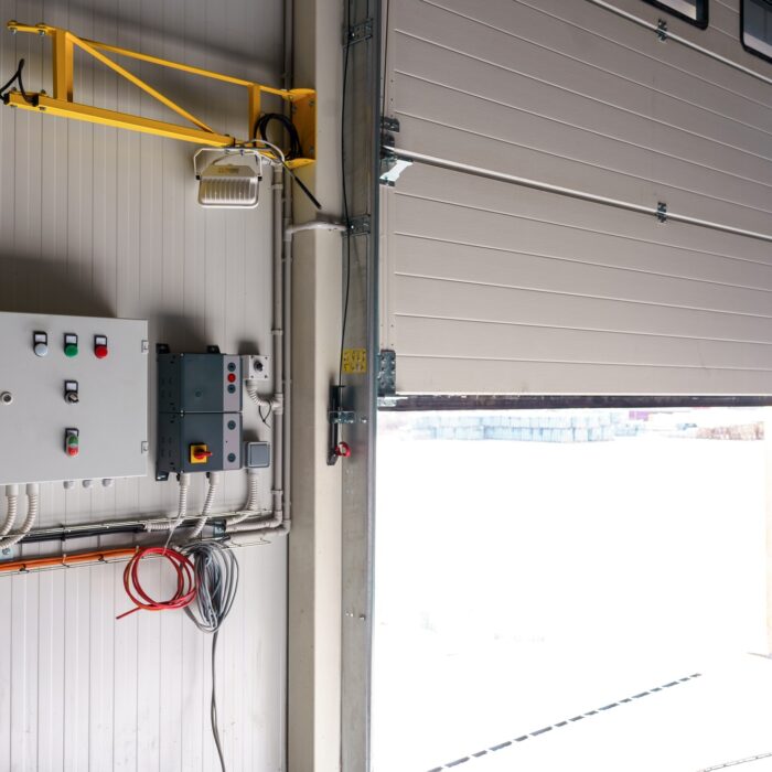 Control units for gates and loading bridges